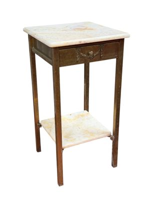 a small table with a marble top on a white background