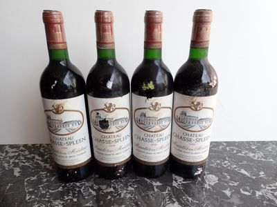 three bottles of wine sitting on top of a table next to each other