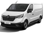 the white van is parked on a white surface