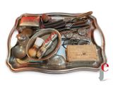 a silver tray with a lot of different items on it