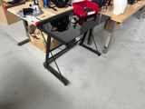 a lot of tools on a workbench in a garage
