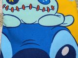 a blue and yellow towel with a cartoon character on it