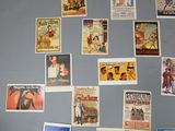 a lot of old movie posters on the refrigerator