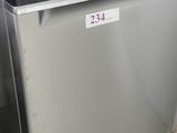 a dishwasher that is sitting in the corner of a kitchen