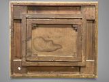 an old picture of a wooden frame with a picture of a shoe on it