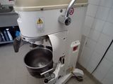 an image of a kitchen with a mixer and a bowl