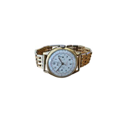 une image d'un gros plan d'une montre-bracelet sur un fond blanc
