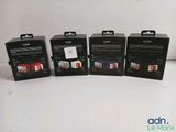three black boxes with pictures on them sitting next to each other