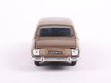 a toy car that is sitting on a white surface