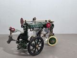 a model of a steam engine on display in a museum