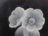 a painting of two flowers in a vase on a table