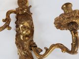 pair of antique brass wall sconces with a woman ' s head and a flower