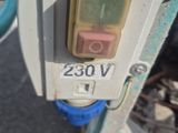 a close up of a parking meter on a street
