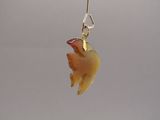 a fish that is hanging from a hook in the air