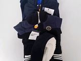 three pairs of winter clothes are stacked on top of each other