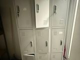 a stack of lockers in the corner of a room
