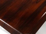 an image of a close up of a wooden tabletop on a white surface
