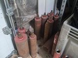 many different types of gas cylinders in a room
