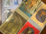 many cards on the table with pictures of ancient egypt