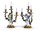 two candles that are sitting next to each other