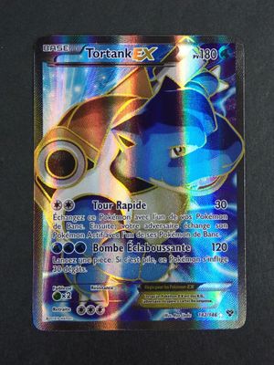 gros plan d'une carte pokemon sur une table