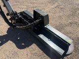 a machine that is sitting on the ground in the dirt