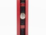 an image of a watch in a red box on a white background