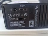 a close up of a small black device on a table