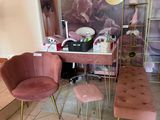 two chairs and a table in a room