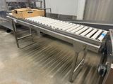 a conveyor belt in a factory with boxes on it