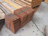 many pieces of wood stacked on top of each other