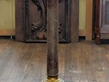 an image of a very old looking clock in a room