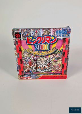 une boîte de mangas posée sur une surface blanche
