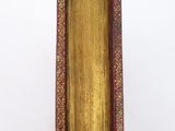 an old book that is sitting on a table