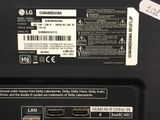 a label on the back of a laptop that says lg
