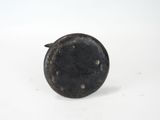 a black object on a white surface with a white background