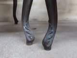 a close up view of the legs of a chair