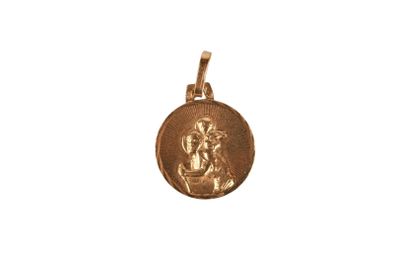 a close up of a gold coin on a white background