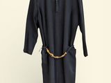an image of a black dress with a gold belt