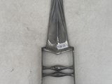 an image of a metal chair with a cone on it