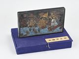 a picture of a box with a painting on it