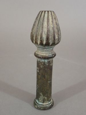 a small metal object that is sitting on a table