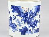 an image of a blue and white vase with a dragon on it