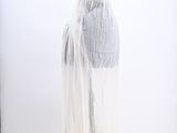 the mannequin dress is white and has a white lace overlay
