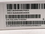 the back of a white box with a barcode on it