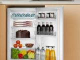 an open refrigerator with a lot of food inside of it