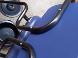 a blue suitcase sitting on top of a blue table