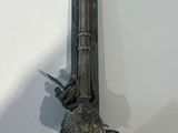 a knife that is hanging on the wall