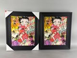 two framed art pieces of betty and betty in a black frame
