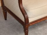 a chair that is sitting in the corner of a room